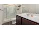 Bathroom featuring a glass shower, modern vanity, and wood-look floors at 2376 E Rosario Mission Dr, Casa Grande, AZ 85194