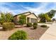 Charming single-story home featuring desert landscaping and an attached two-car garage at 2376 E Rosario Mission Dr, Casa Grande, AZ 85194