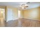 Spacious bedroom with hardwood floors, a ceiling fan, and great natural light at 2439 W White Feather Ln, Phoenix, AZ 85085