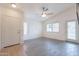 Inviting living area with tiled entryway and plank flooring at 2439 W White Feather Ln, Phoenix, AZ 85085