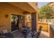 Relaxing outdoor patio featuring comfortable seating and garden views for enjoying the sunshine at 250 W Queen Creek Rd # 146, Chandler, AZ 85248