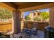 Cozy outdoor patio, perfect for relaxing and entertaining with views of the community and landscaping at 250 W Queen Creek Rd # 146, Chandler, AZ 85248