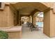 Inviting community pool with covered lounge area and seating at 250 W Queen Creek Rd # 146, Chandler, AZ 85248