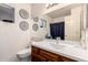 Updated bathroom boasts a modern vanity, mirror, and updated fixtures at 2512 N Central Dr, Chandler, AZ 85224