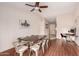 Dining area adjacent to the kitchen, showcasing ample seating and warm natural light at 2512 N Central Dr, Chandler, AZ 85224