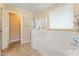 Bright bathroom with a soaking tub and walk-in shower at 2748 W Sunland Ave, Phoenix, AZ 85041