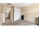 Bedroom with closet and view into the bathroom at 2748 W Sunland Ave, Phoenix, AZ 85041