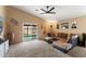 Living room with high ceilings and sliding doors providing access to the backyard at 2748 W Sunland Ave, Phoenix, AZ 85041