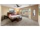 Main bedroom featuring a large bay window, allowing for plenty of natural light at 2748 W Sunland Ave, Phoenix, AZ 85041