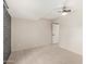 Bedroom featuring tile floor, ceiling fan, neutral paint, and a brick accent wall at 302 W Thunderbird Rd, Phoenix, AZ 85023