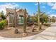 View of home displaying desert landscaping and rock accents around native cacti at 3123 E Cat Balue Dr, Phoenix, AZ 85050