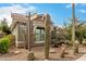 View of home with desert landscaping and local signage at 3123 E Cat Balue Dr, Phoenix, AZ 85050