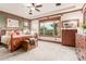 Serene main bedroom featuring natural light and wood trim at 3123 E Cat Balue Dr, Phoenix, AZ 85050