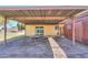 Spacious carport featuring a covered parking area next to a home at 3324 W Tangerine Ln, Phoenix, AZ 85051