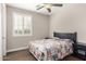 Bright bedroom featuring a patterned quilt, shutters, and bedside tables at 3632 E Comstock Dr, Gilbert, AZ 85296