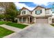 Charming two-story home with a welcoming front porch and a large driveway at 3632 E Comstock Dr, Gilbert, AZ 85296