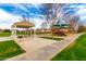 Park featuring playground, picnic tables, and barbecue grills, perfect for community gatherings and recreation at 3632 E Comstock Dr, Gilbert, AZ 85296