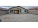 A spacious backyard with gravel ground cover provides a low-maintenance outdoor space at 3829 W Ashton Dr, Anthem, AZ 85086