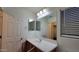 Bathroom with a large mirror and a white sink at 3829 W Ashton Dr, Anthem, AZ 85086