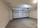 Clean, empty garage provides ample space for parking and storage at 3829 W Ashton Dr, Anthem, AZ 85086