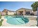 An in-ground pool and hot tub offer a refreshing escape in the backyard of this single Gathering home at 3904 E Carter Dr, Phoenix, AZ 85042