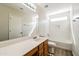 Bathroom featuring a vanity with a walk in shower and bathtub, offering plenty of convenience and style at 40144 N Lerwick Dr, San Tan Valley, AZ 85140