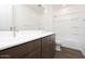 Bathroom featuring double sink vanity and glass enclosed shower at 40250 N Alegre Dr, San Tan Valley, AZ 85140