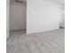Spacious bedroom with soft carpet and entryway to another room at 40250 N Alegre Dr, San Tan Valley, AZ 85140