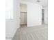 Carpeted bedroom featuring closet, window and doorway at 40250 N Alegre Dr, San Tan Valley, AZ 85140