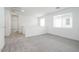 Cozy loft area featuring plush gray carpeting and natural light at 40250 N Alegre Dr, San Tan Valley, AZ 85140