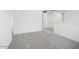 Upstairs loft area with soft carpeting and white walls at 40250 N Alegre Dr, San Tan Valley, AZ 85140
