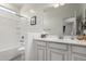 Bathroom features a single sink, a tub and shower combination, and wood-look tile flooring at 4116 E Roy Rogers Rd, Cave Creek, AZ 85331