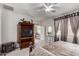 Bedroom features carpet, a ceiling fan, and open doorway to another room at 4116 E Roy Rogers Rd, Cave Creek, AZ 85331