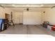 Spacious garage with epoxy flooring, lots of storage cabinets, and plenty of space at 4116 E Roy Rogers Rd, Cave Creek, AZ 85331