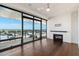 Living room with hardwood floors, recessed lighting, and expansive city views at 4422 N 75Th St # 8005, Scottsdale, AZ 85251