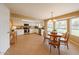 Bright kitchen with stainless steel appliances and a charming breakfast nook with pool views at 4523 W Bluefield Ave, Glendale, AZ 85308