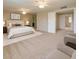 Spacious carpeted main bedroom with dual ceiling fans, and ensuite access at 4523 W Bluefield Ave, Glendale, AZ 85308