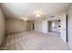 Large main bedroom features carpeted floor, two ceiling fans, and access to an ensuite at 4523 W Bluefield Ave, Glendale, AZ 85308