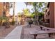 Community area with grill, picnic bench and covered patio at 4704 E Paradise Village Pkwy # 213, Phoenix, AZ 85032