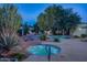 Inviting community pool featuring a hot tub, desert landscaping, and a tranquil atmosphere at 5101 N Casa Blanca Dr # 217, Paradise Valley, AZ 85253