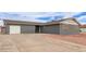 Cozy one-story home features a long driveway and a detached garage at 5208 W Earll Dr, Phoenix, AZ 85031