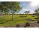 Lush community park offering serene green spaces and mature trees for residents to enjoy outdoor activities at 5621 N 189Th Dr, Litchfield Park, AZ 85340