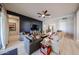 Inviting living room with stylish furniture, a ceiling fan, and ample natural light at 5621 N 189Th Dr, Litchfield Park, AZ 85340