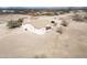 Scenic view of desert home and nearby mountain range in the distance at 6431 N 418Th Ave, Tonopah, AZ 85354