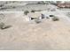 Desert home with light beige exterior and spacious desert lot with some trees at 6431 N 418Th Ave, Tonopah, AZ 85354