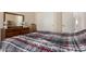 Bedroom featuring neutral walls and a closet with mirrored doors at 6431 N 418Th Ave, Tonopah, AZ 85354