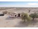 Single-story home featuring a desert landscape and xeriscaping at 6431 N 418Th Ave, Tonopah, AZ 85354