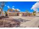 Charming two-story home with a three car garage and desert landscaping at 6812 S 45Th Ave, Laveen, AZ 85339