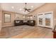 Spacious living room with vaulted ceiling and a large sliding window for natural light at 700 W Gascon Rd, San Tan Valley, AZ 85143