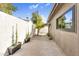 Private backyard featuring drought tolerant landscaping and a serene walkway, perfect for enjoying the outdoors at 718 E Tuckey Ln, Phoenix, AZ 85014